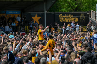 Cambridge United celebrate staying up